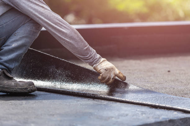 Professional Basement Waterproofing technician working in New Vienna, OH